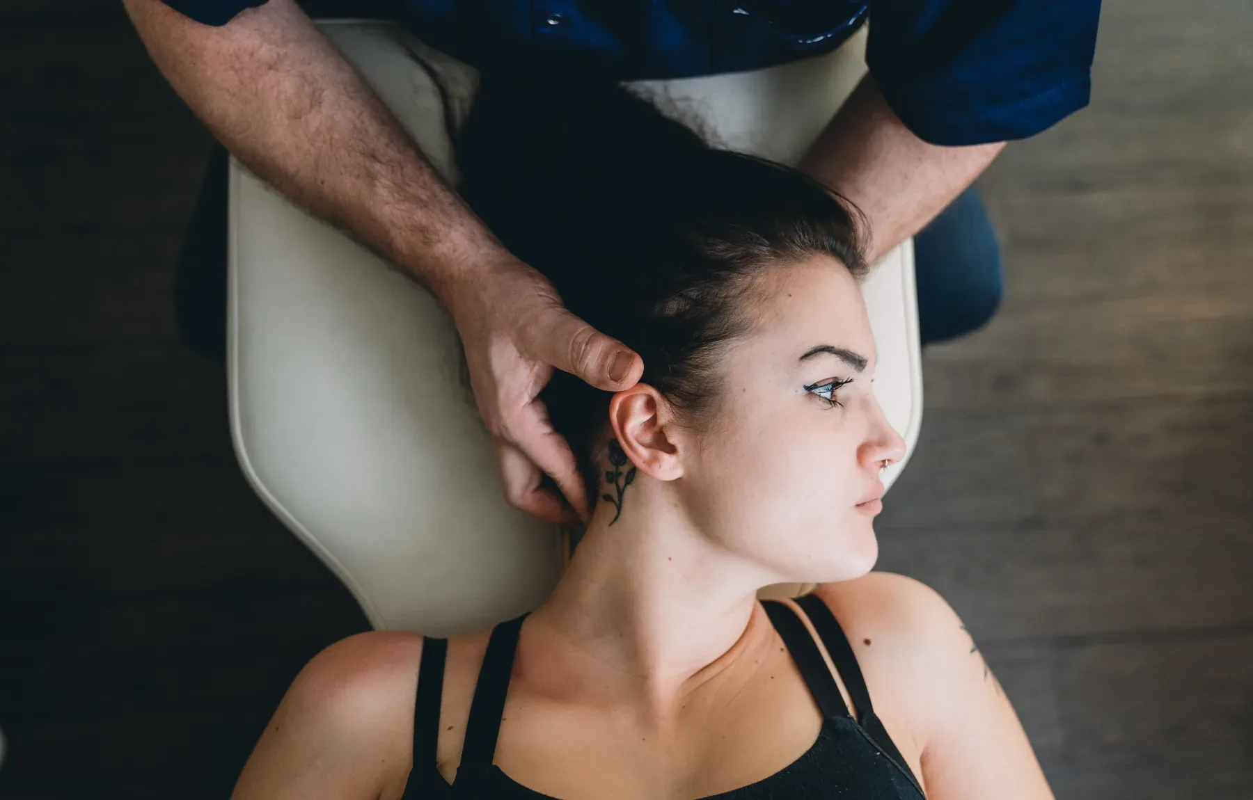 chiropractor treating text neck